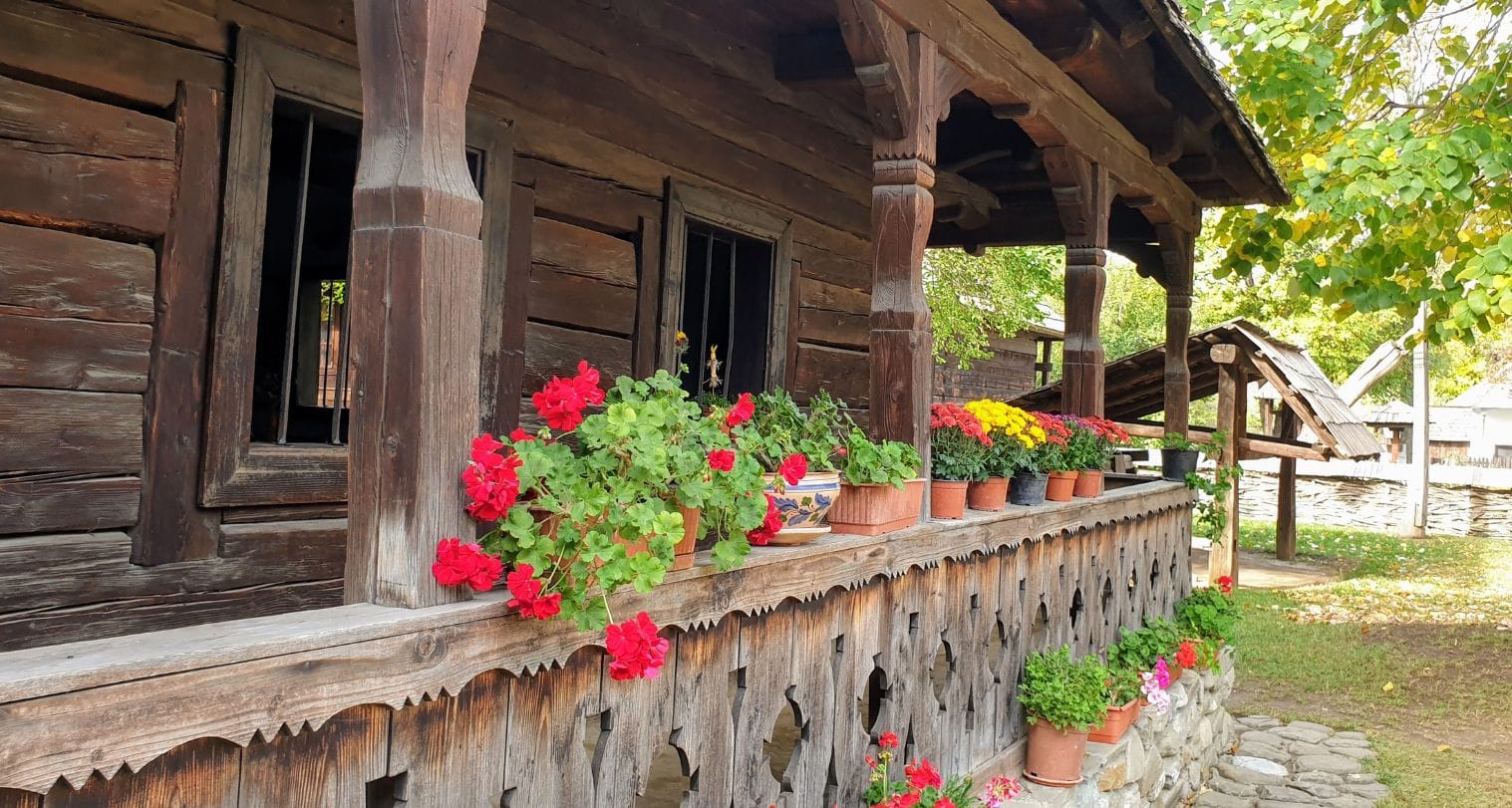 Flowers on the veranda of a Romanian peasant house Flowers on the veranda of a Romanian peasant house